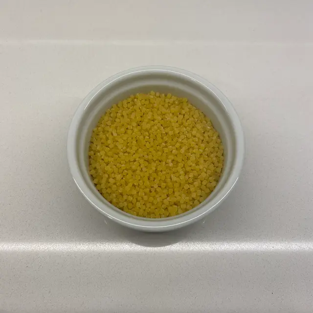 Acini di pepe in a round white ramekin