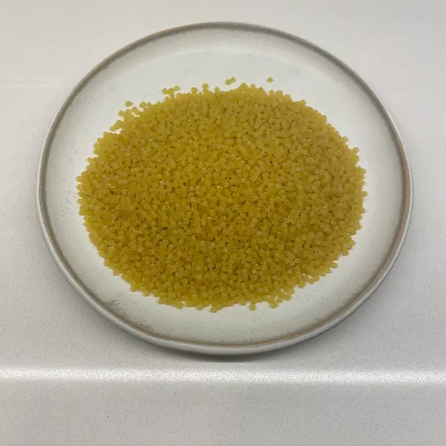 Acini di pepe on a round white plate