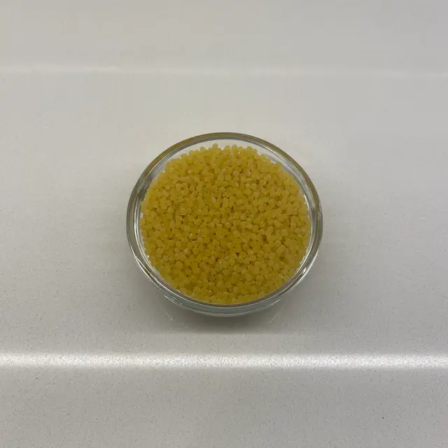 Acini di pepe in a small round white glass bowl