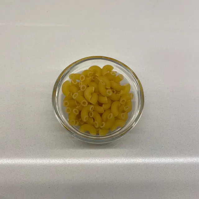 Small Elbow Macaroni in a small round white glass bowl