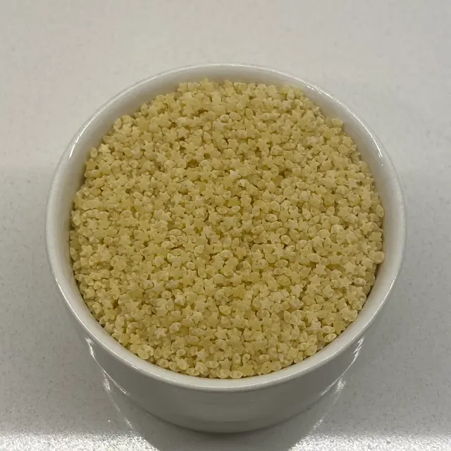 A close up shot of Pastina in a small white bowl