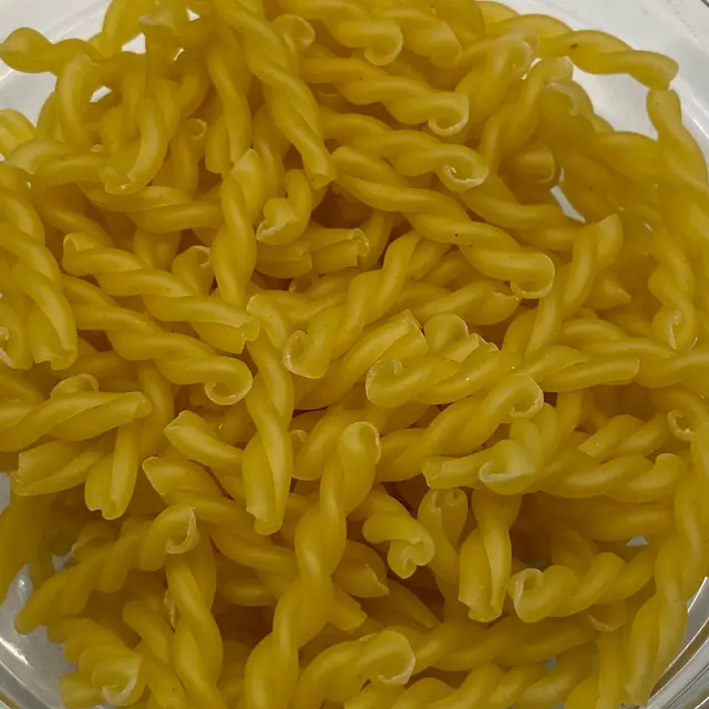 A close up shot of Treccine in a clear round glass bowl